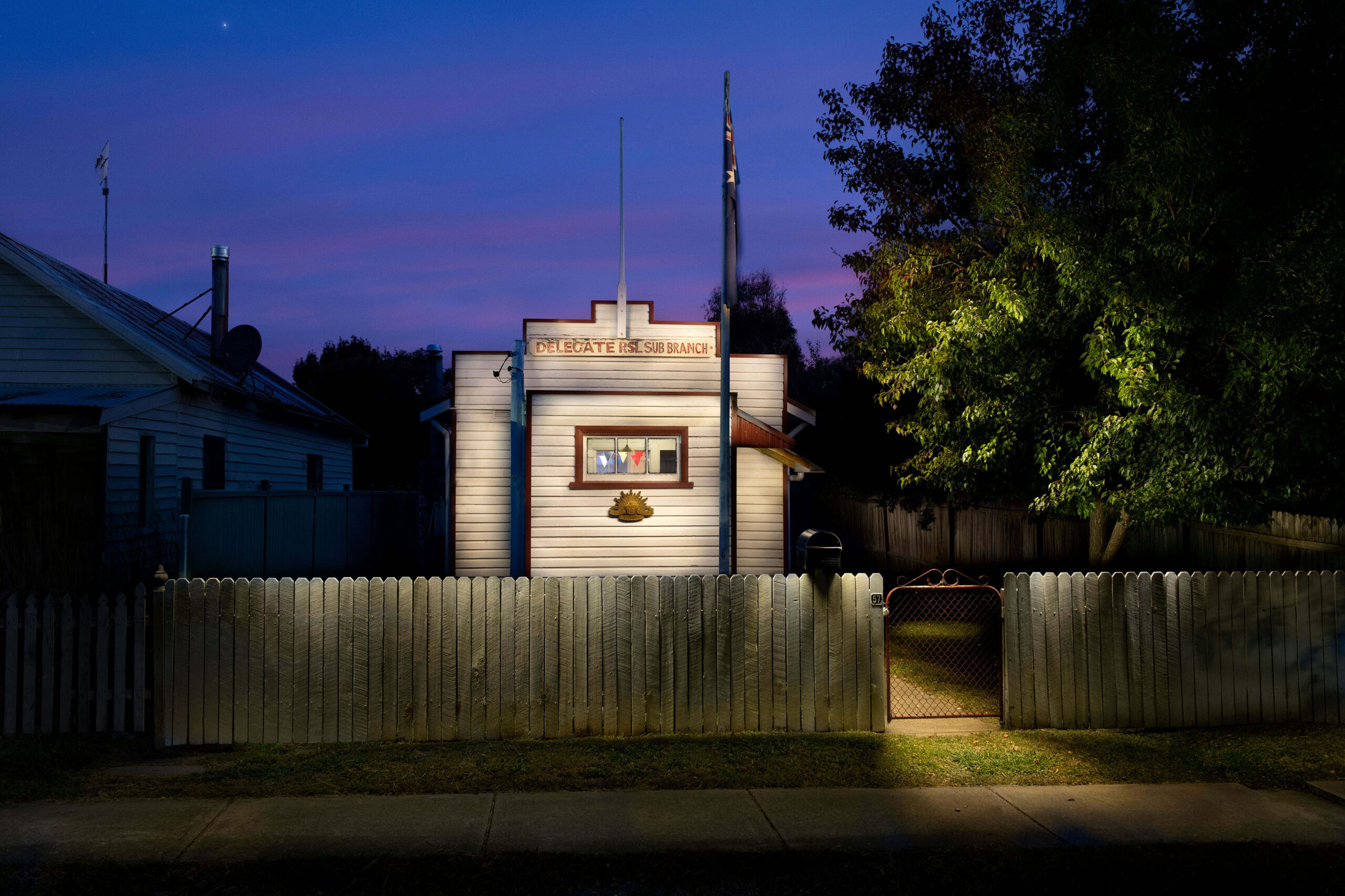 An RSL site illuminated at night